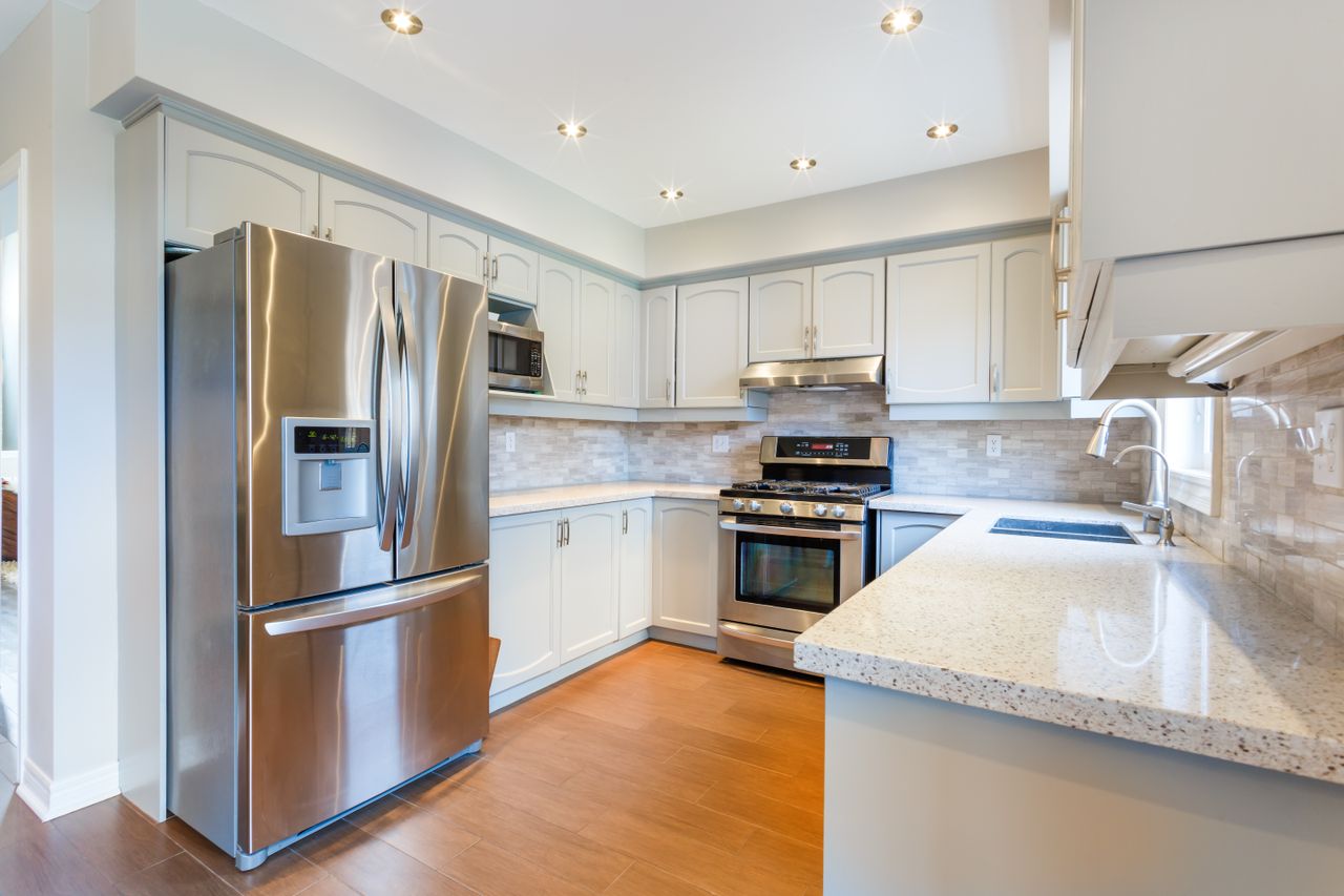 Modern kitchen with stainless steel appliances and ample counter space