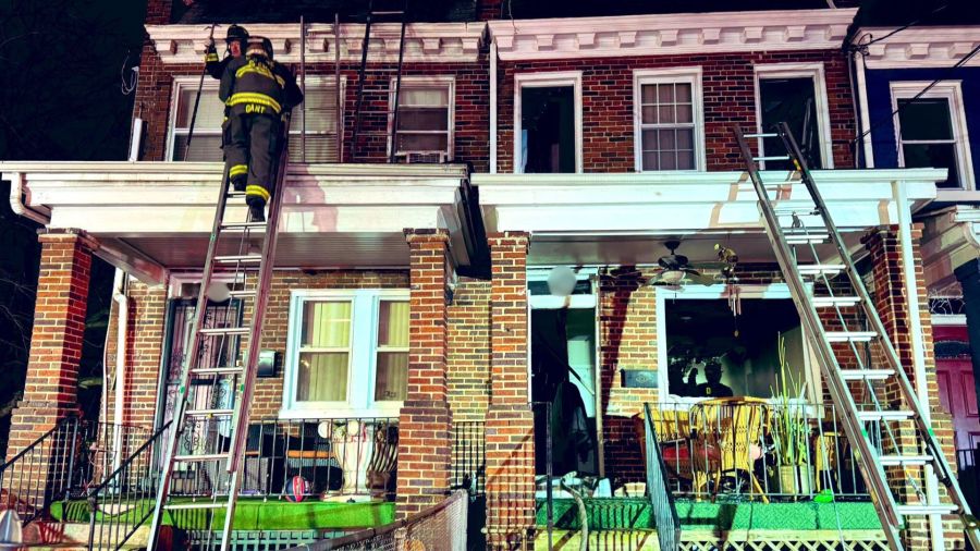DC firefighters extinguish early morning row house fire