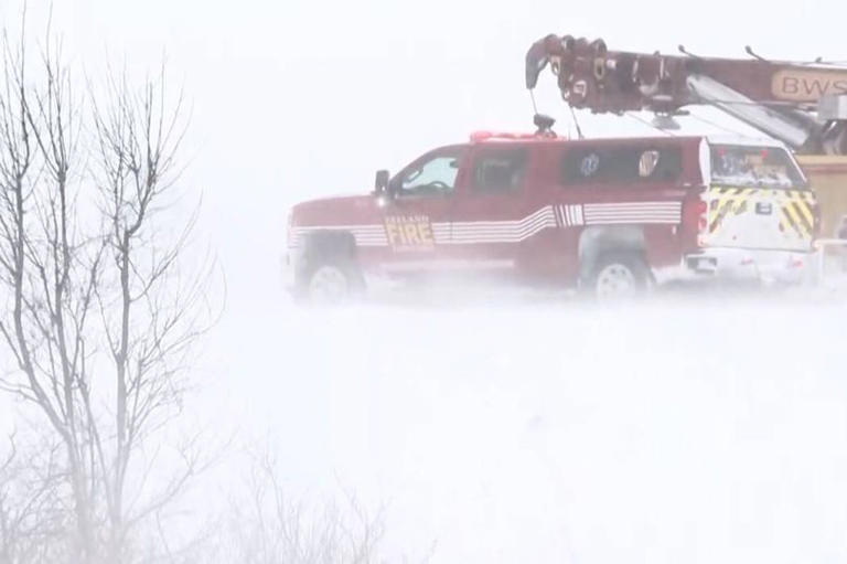 100 car pile-up chaos as snow storm slams into US leaving busy road ...