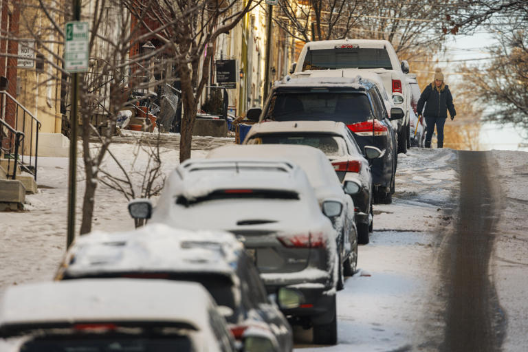 Philly area measures weekend snowfall totals as winter's coldest ...