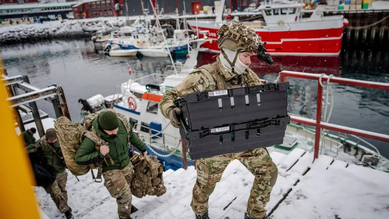 Denmark rushes more troops to Greenland after Trump threatens tariffs ...
