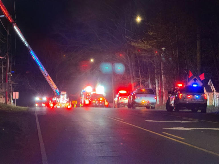 Crews battle house fire on High Point Road in Winston-Salem