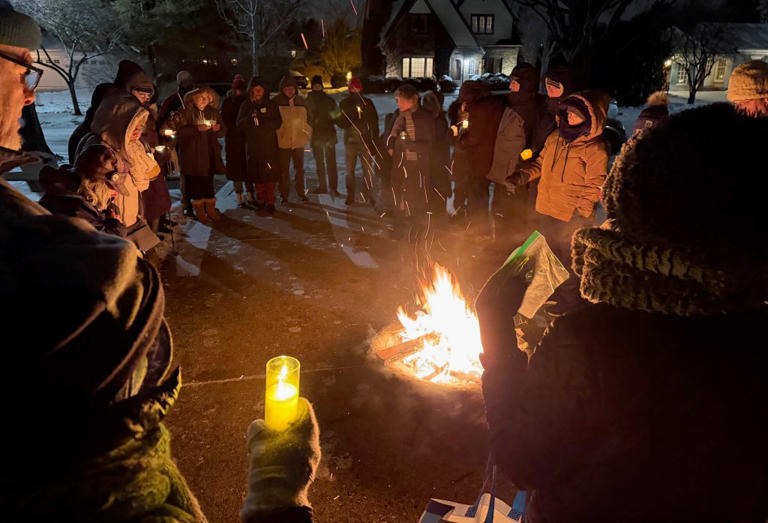Residents hold candlelight vigil Jan. 25 after national calls for ...