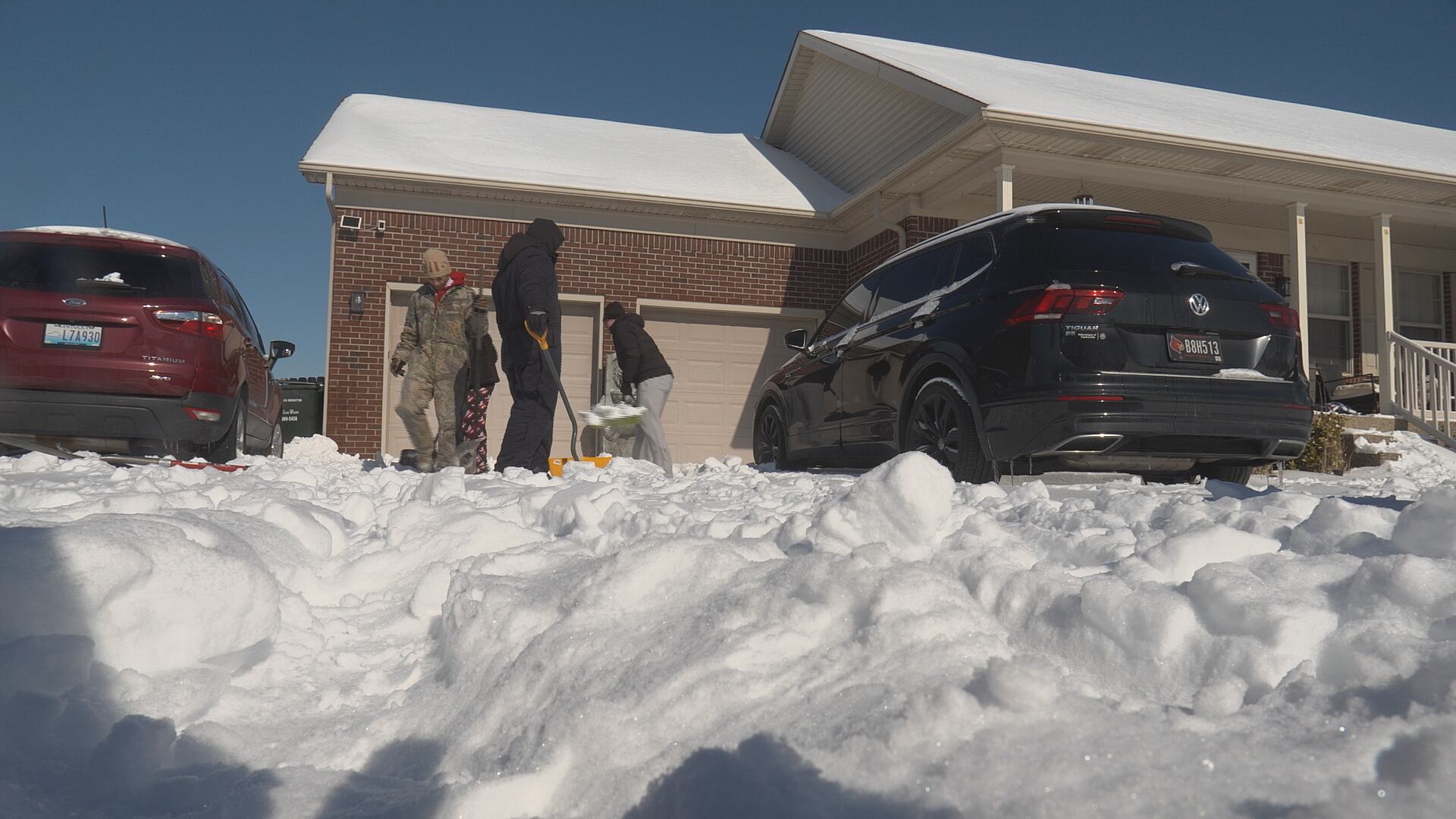 High school football players help neighbors dig out in Bullitt County