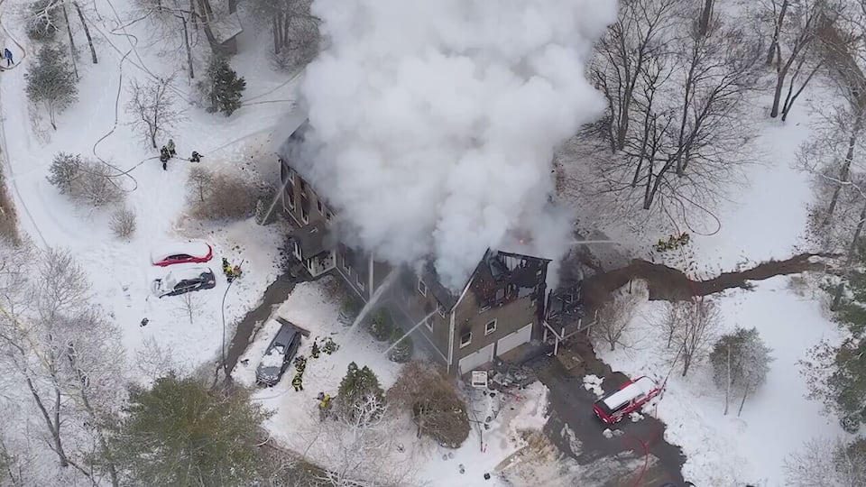 Crews work to put out house fire in Mattapoisett
