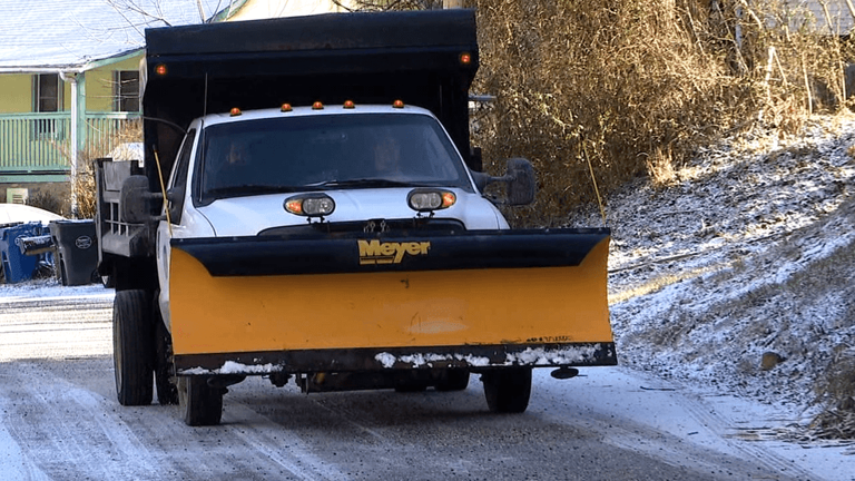 Waynesville crews work to clear roads after weekend winter storm