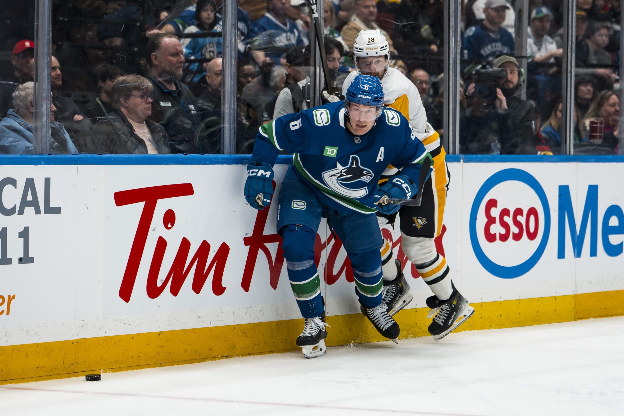 ‘Vicious hit to the head’: Foote and DeBrusk react after Canucks ...