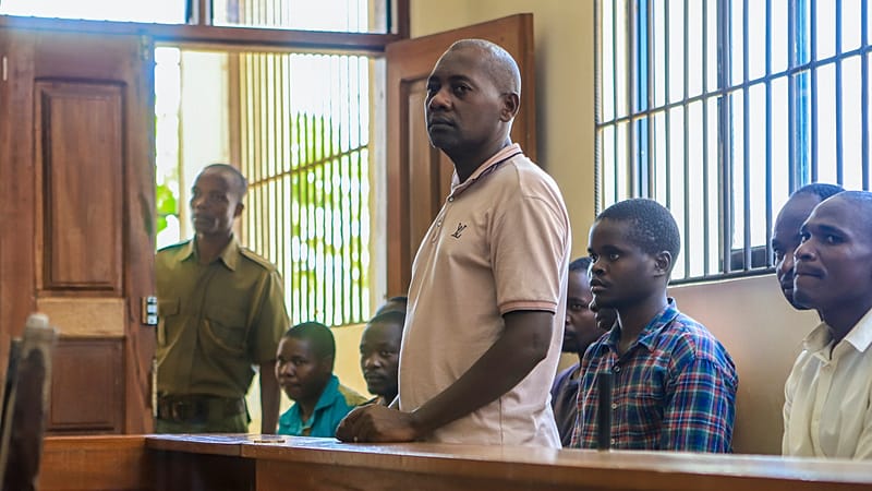 FILE - Extremist evangelical leader Paul Mackenzieappears at a court accompanied by some of his followers in Malindi, Kenya on Monday, April 17, 2023.