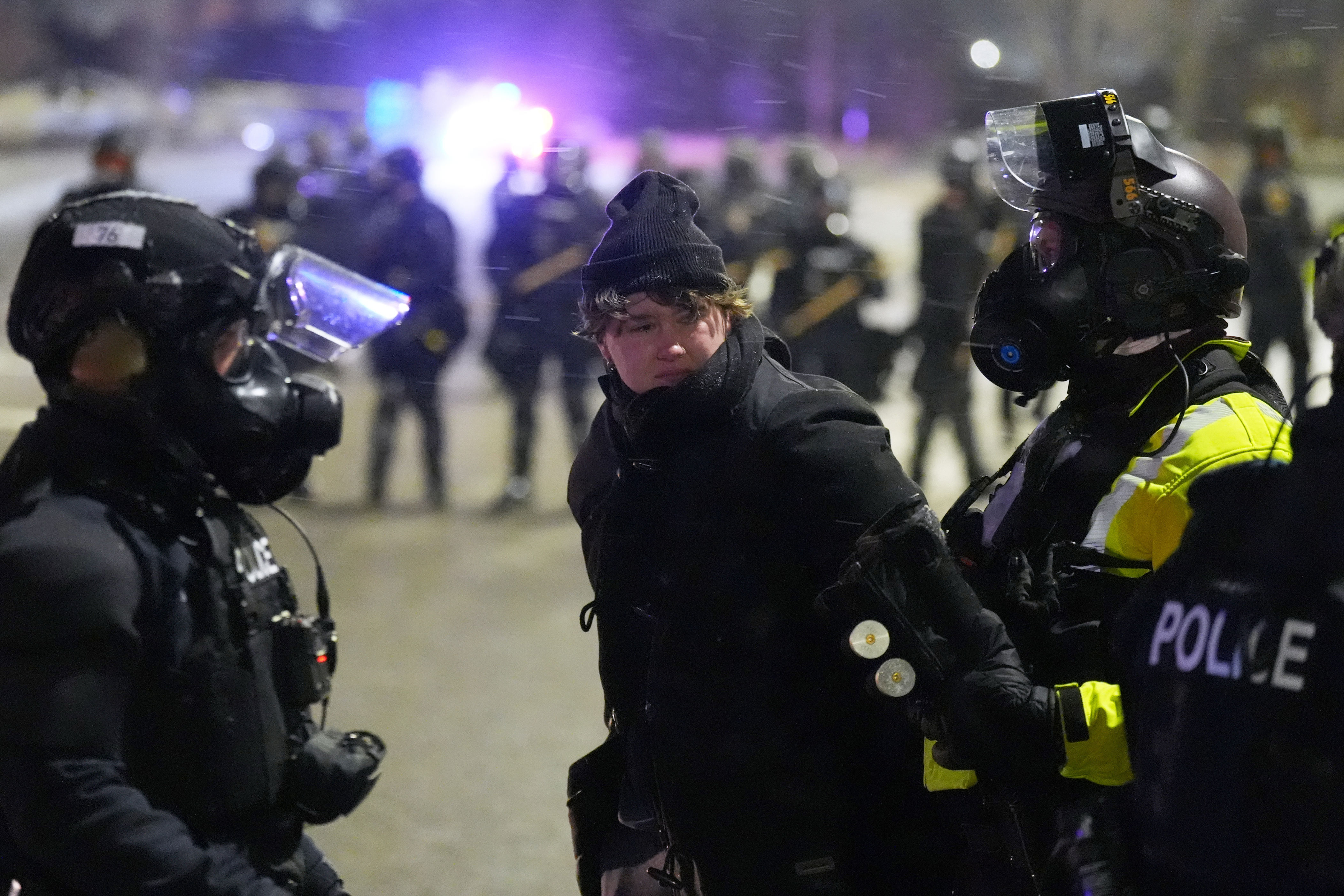 Police arrest protesters outside Minnesota hotel believed to house ICE ...
