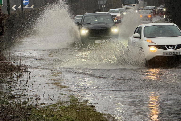 In pictures: Cars battle through major flooding between Horsham and Crawley