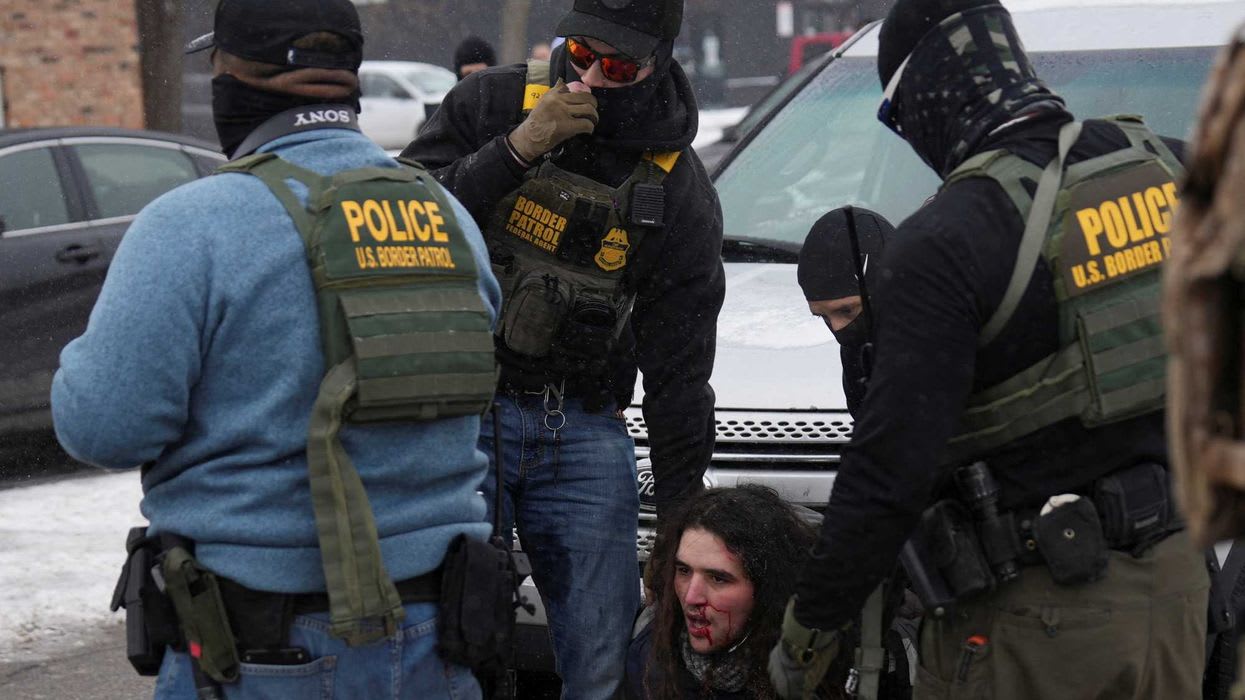 Federal agents detain a resident as immigration enforcement continues after an ICE agent fatally shot Renee Nicole Good on January 7 during an immigration raid, in Minneapolis, Minnesota on Jan. 21, 2026. REUTERS/Leah Millis