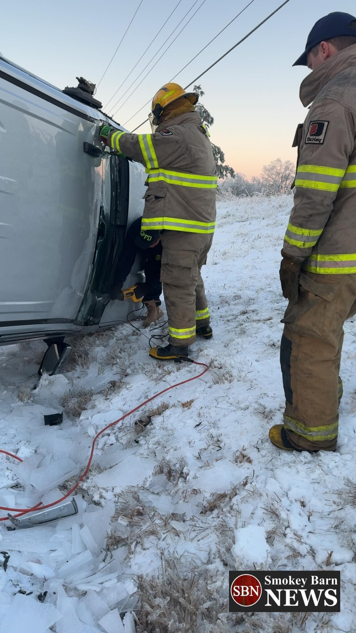 Crews rescue trapped driver after icy rollover crash in Middle TN