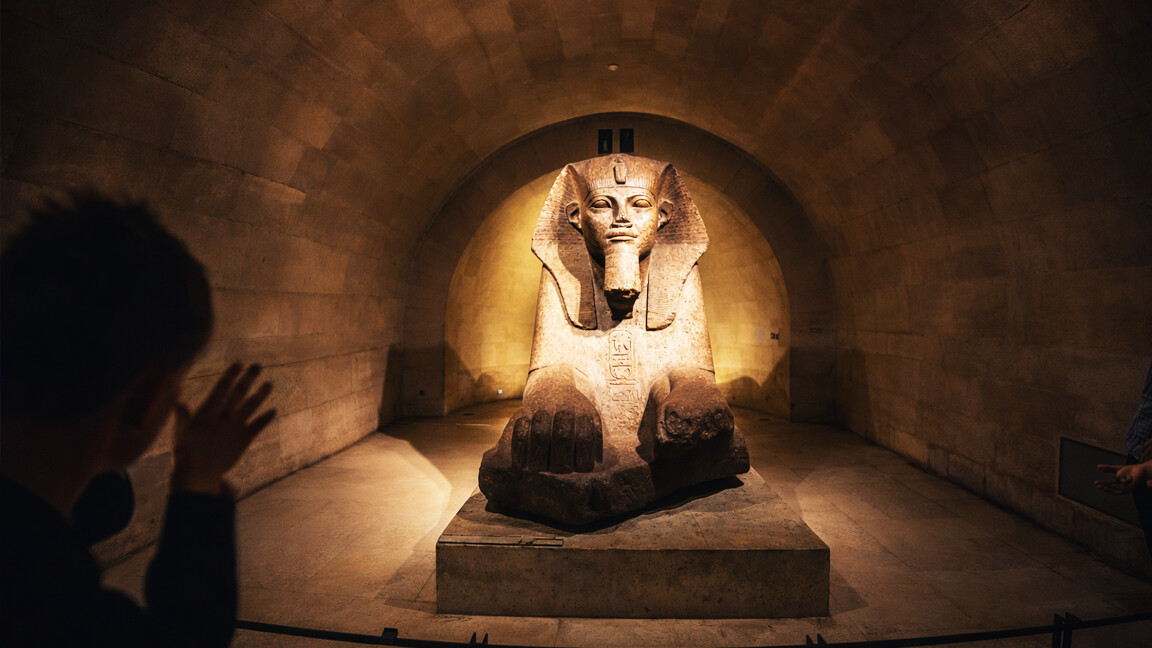 Exploring ancient sculptures inside the Louvre