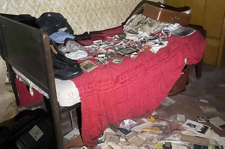 'Frozen in time' abandoned home with unexplained photos and poignant past