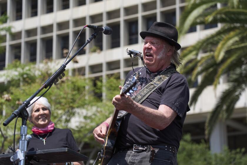 To take the edge off world events, Neil Young gives Greenlanders access ...