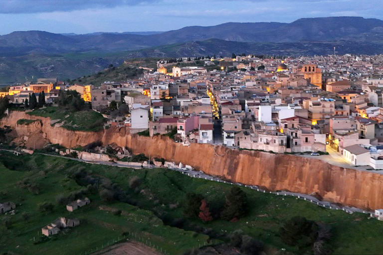 Huge landslide cleaves off the edge of a town in Sicily and forces the  evacuation of 1,500 people