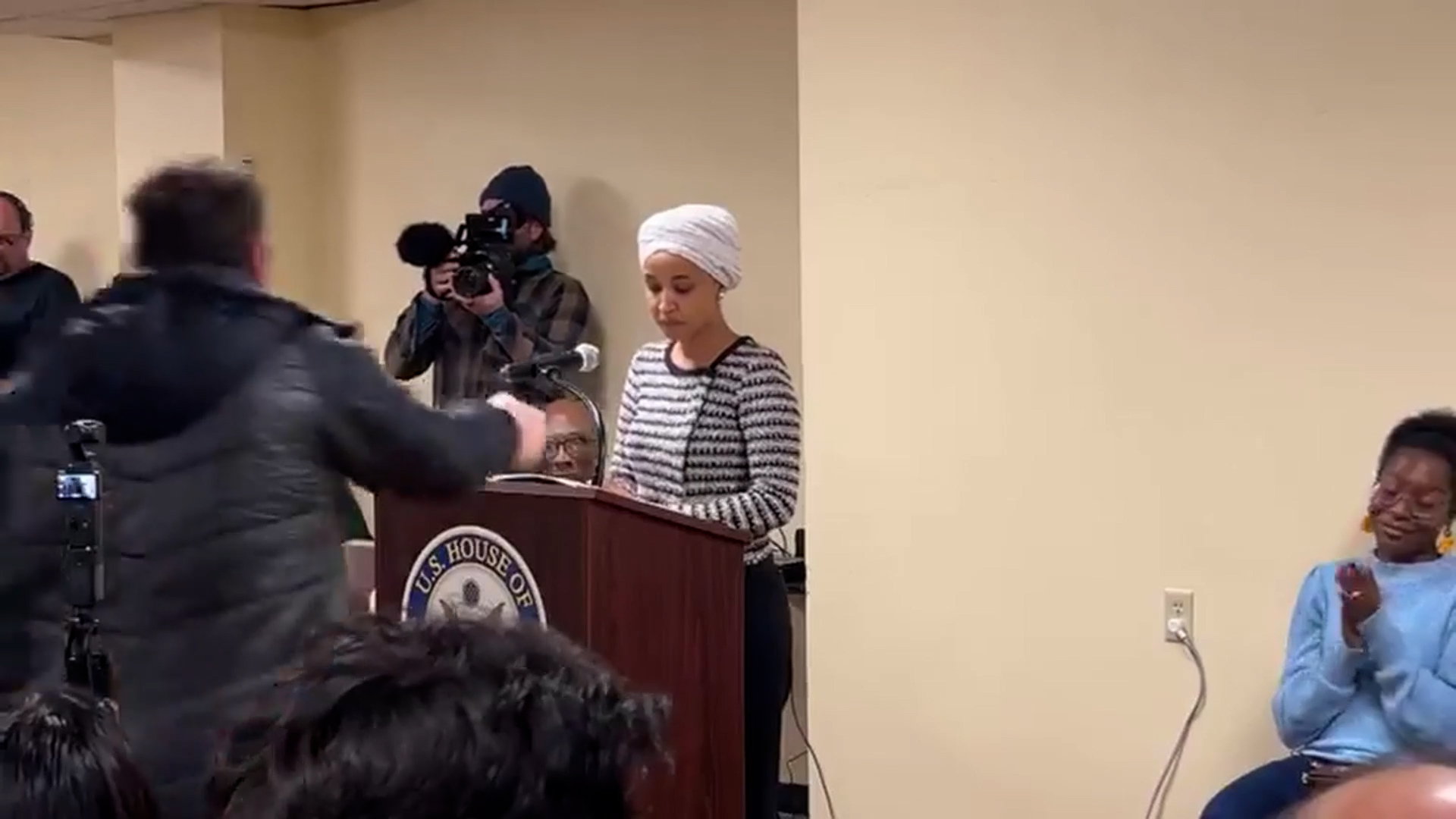 Rep. Ilhan Omar sprayed with mystery liquid by a man at Minnesota town hall