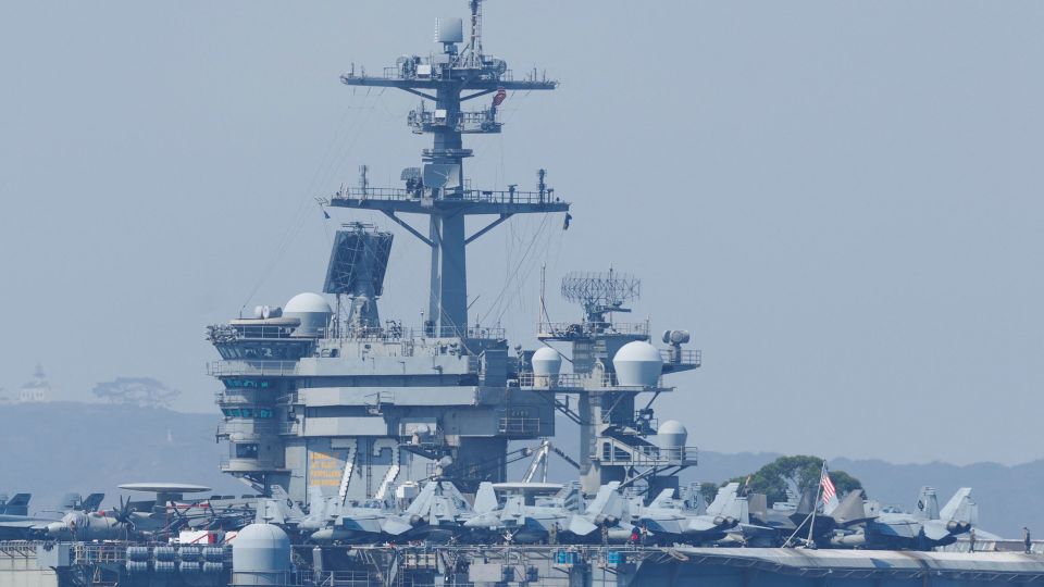 US carrier shoots down Iranian drone as tensions escalate and diplomatic talks hit a snag<br>