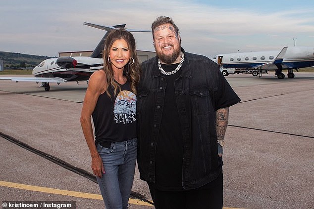 Jelly Roll pictured cozying up to Kristi Noem in resurfaced snaps