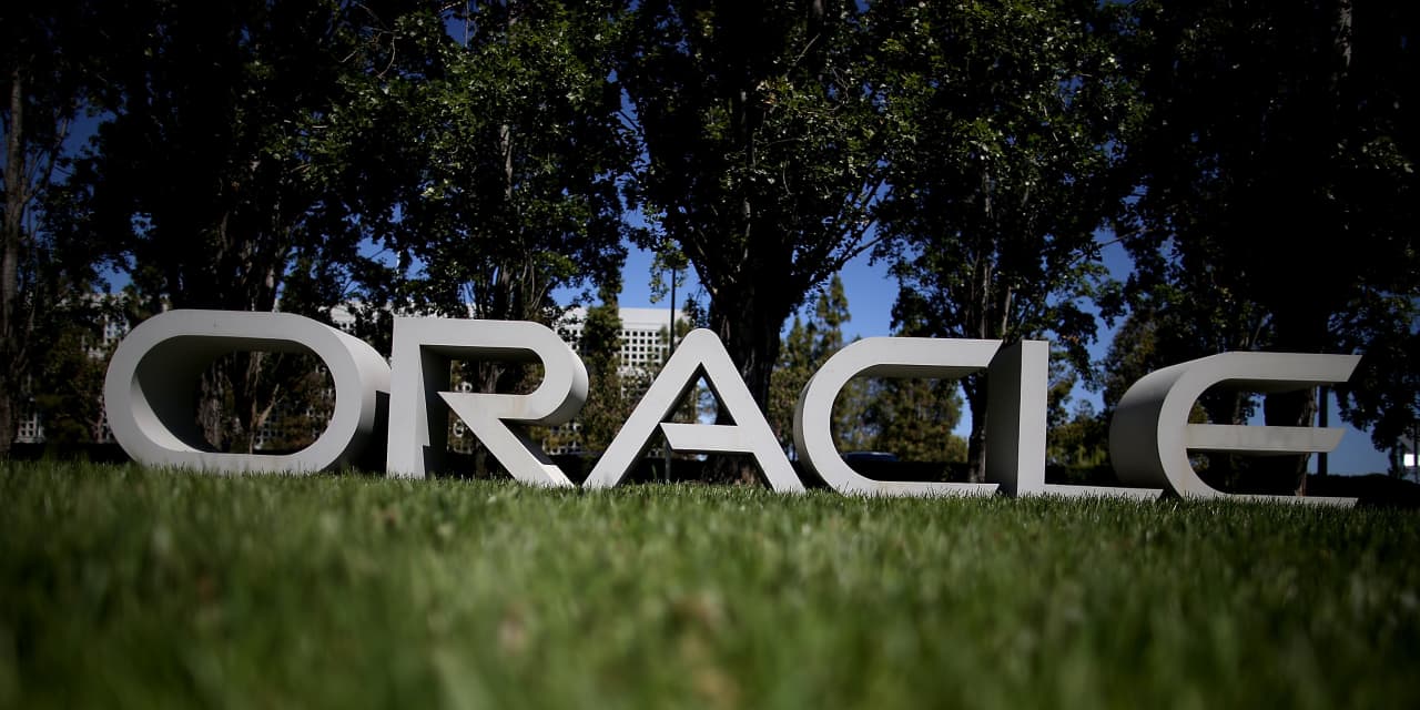 Oracle’s stock rises as company reportedly begins thousands of job cuts