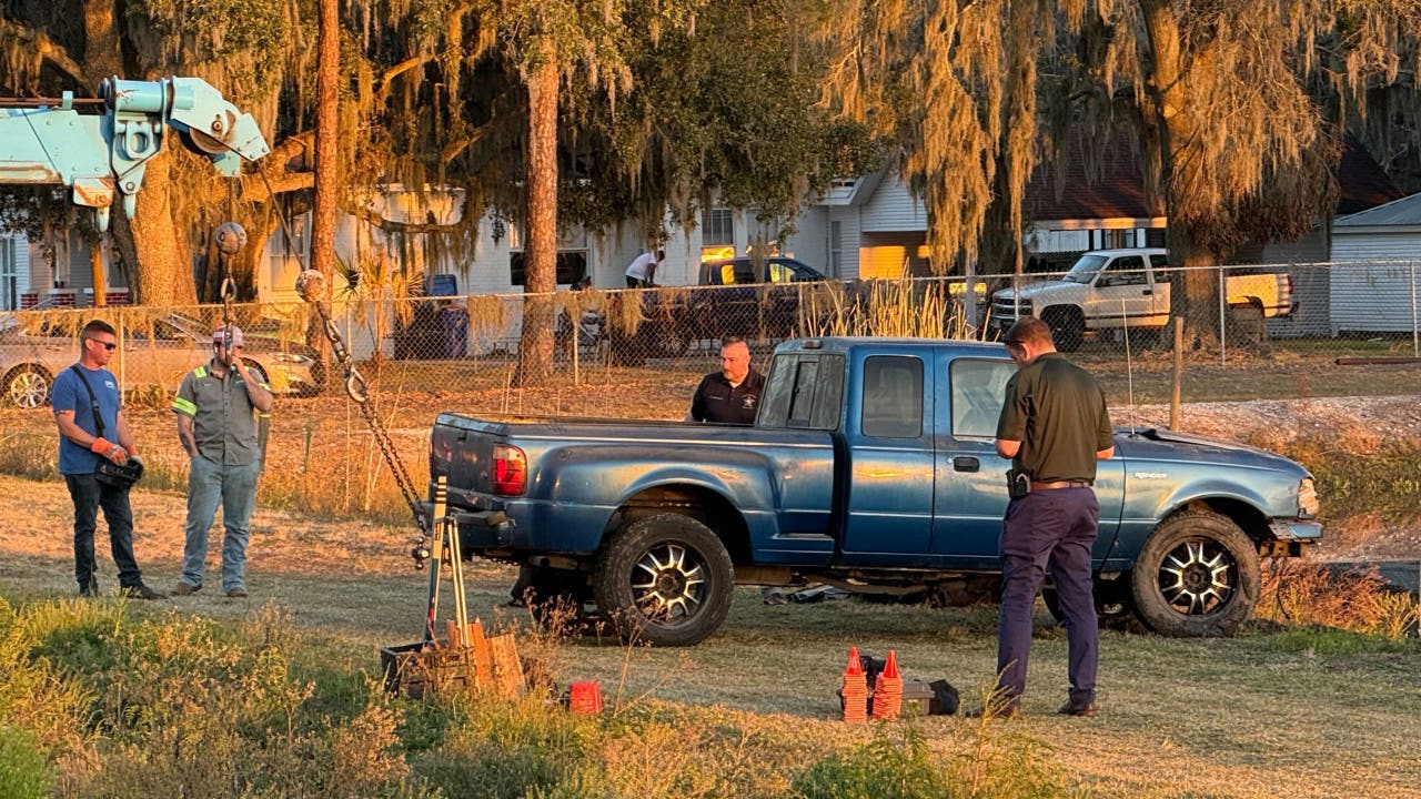 Body found inside truck submerged in Plant City pond during search for ...