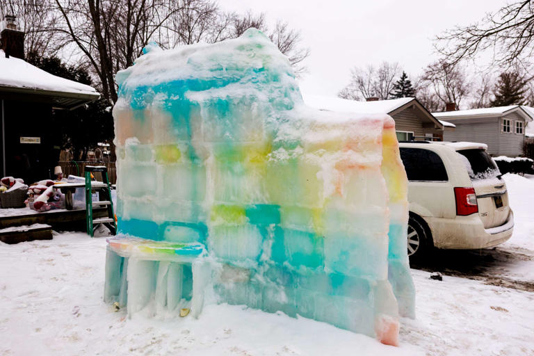See the light-up rainbow igloo on this Ann Arbor family’s front lawn