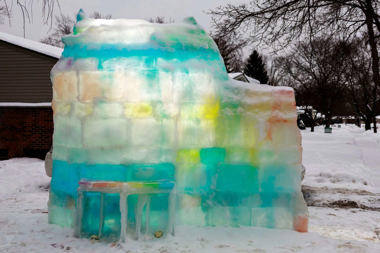 See the light-up rainbow igloo on this Ann Arbor family’s front lawn