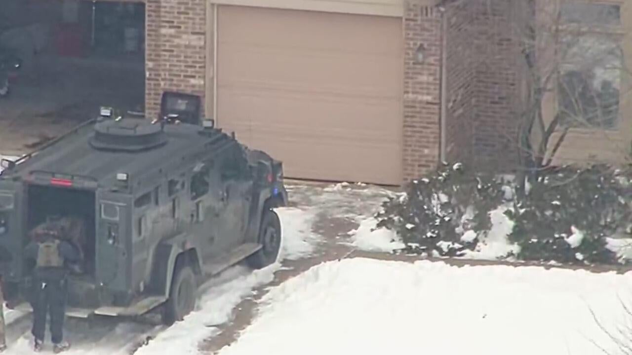 Police take suspect into custody after standoff in Livonia