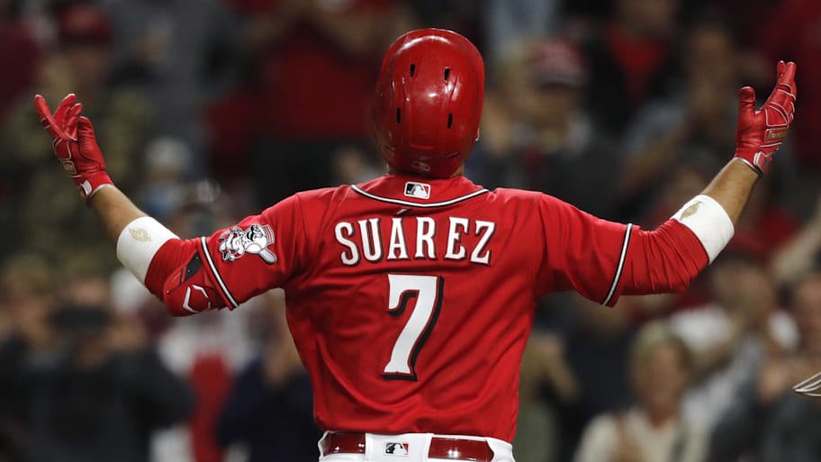 Eugenio Suarez move helps Reds keep pace in crowded NL Central
