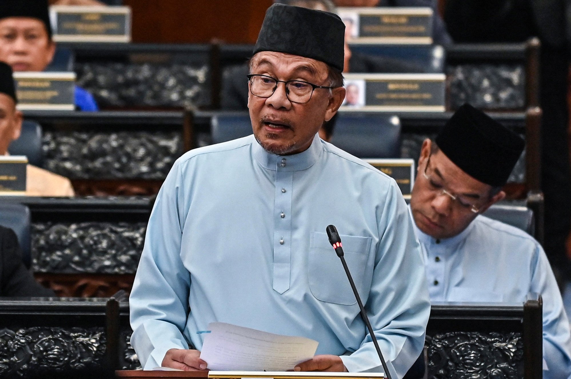 Malaysian Prime Minister Anwar Ibrahim speaks in parliament in 2023. Photo: Malaysia's Department of Information/AFP