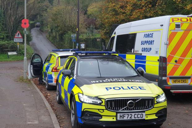 Two arrested as police raid homes