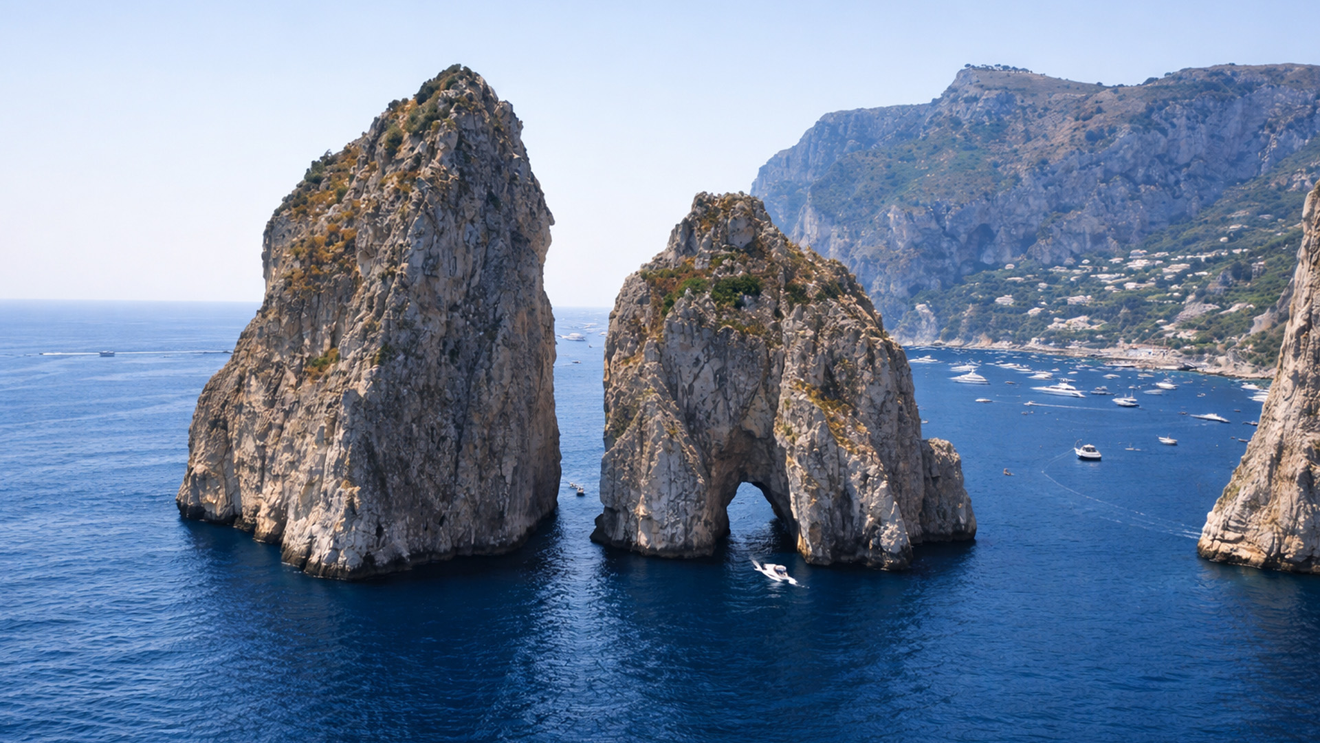 Giant rocks rising from the blue sea