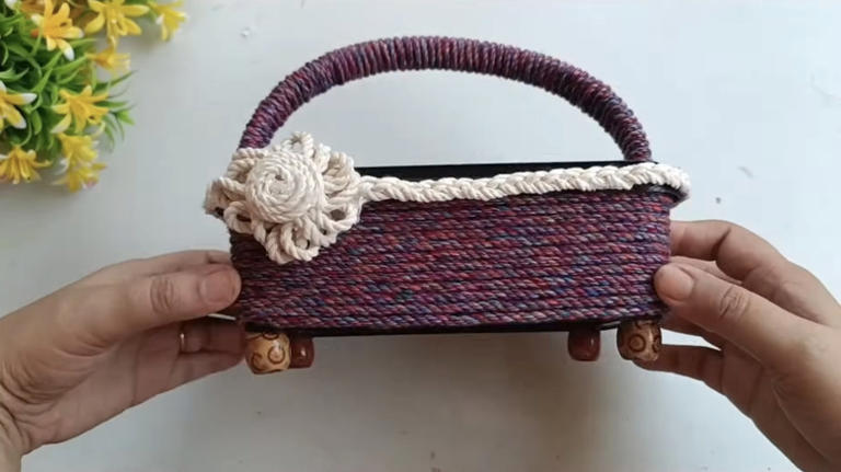 Reuse an empty Swiffer container to DIY a trendy kitchen storage solution