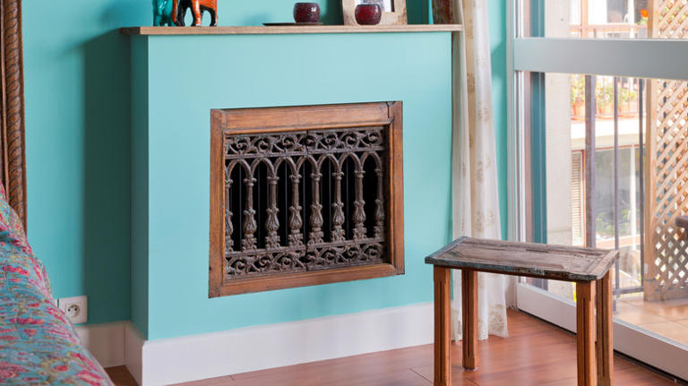 What those ugly radiator covers along your walls are really designed to do