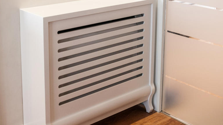 What those ugly radiator covers along your walls are really designed to do