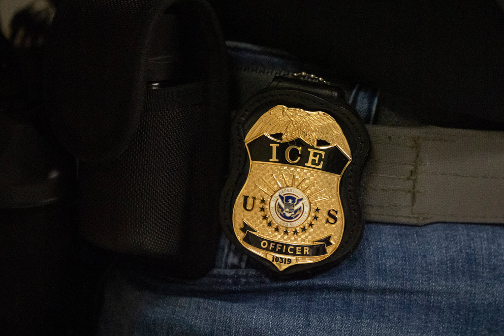 New Orleans police say recruit detained by ICE had been verified through agency