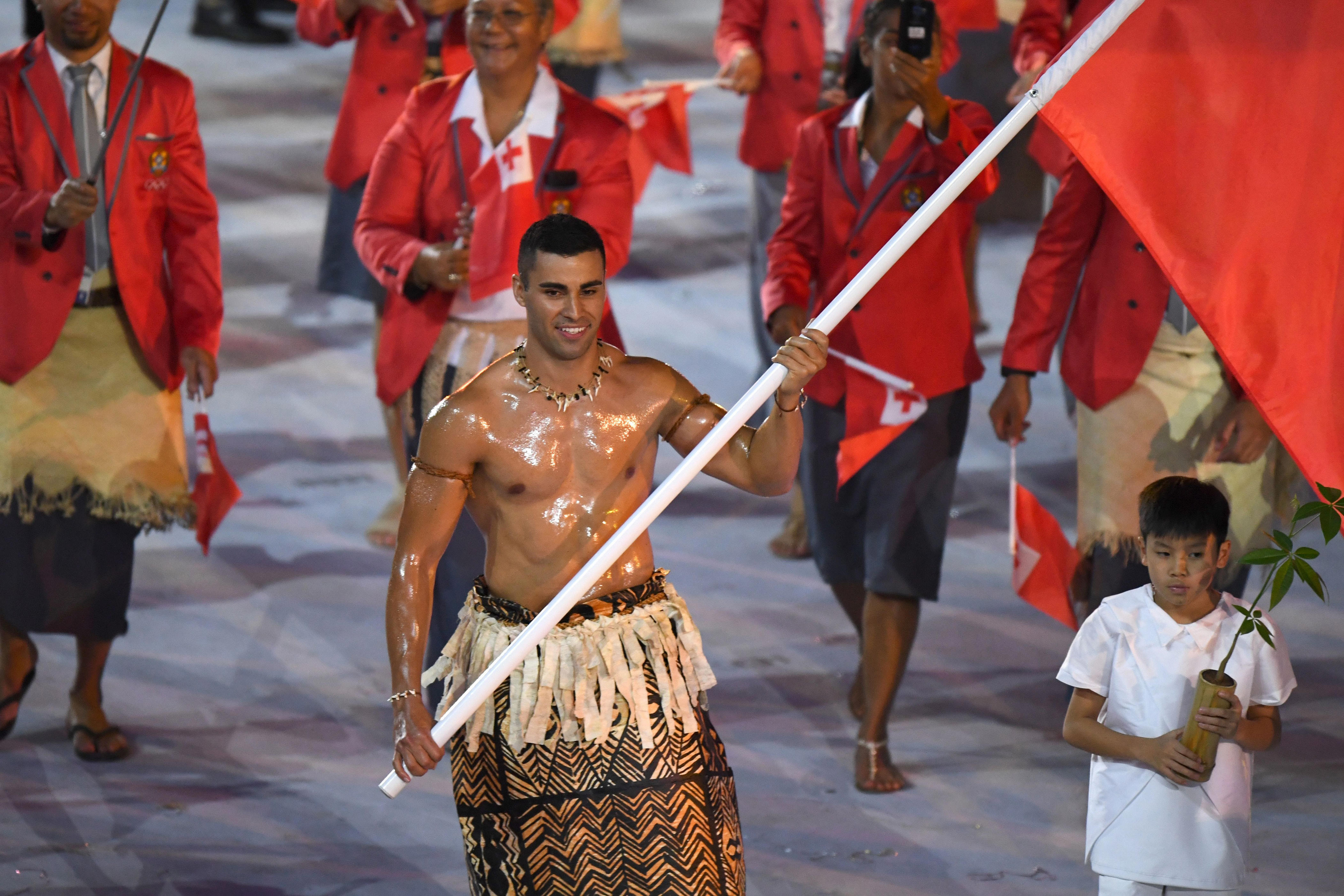 2026 Winter Olympics features return of Tonga’s shirtless flag bearer<br>