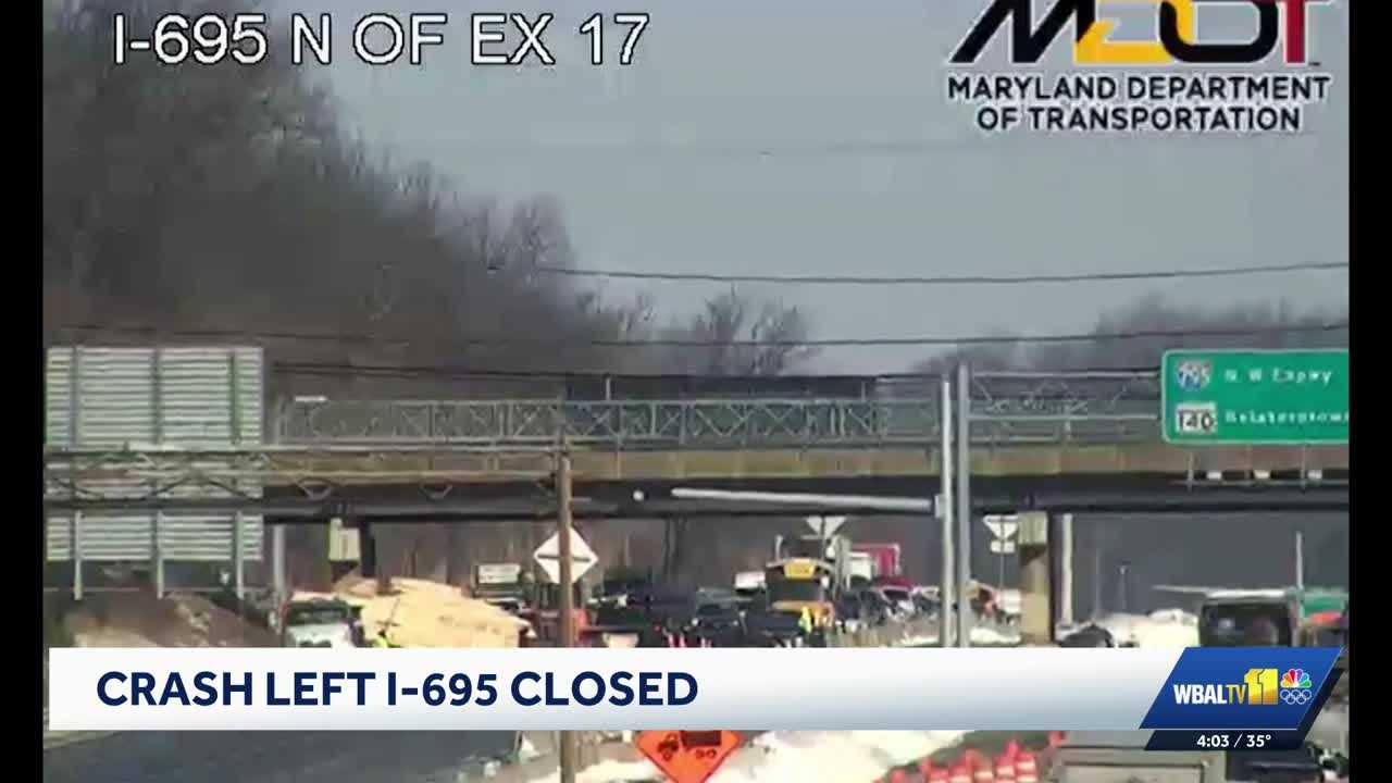 Tractor trailer crash dumps wood across Interstate 695 in Woodlawn
