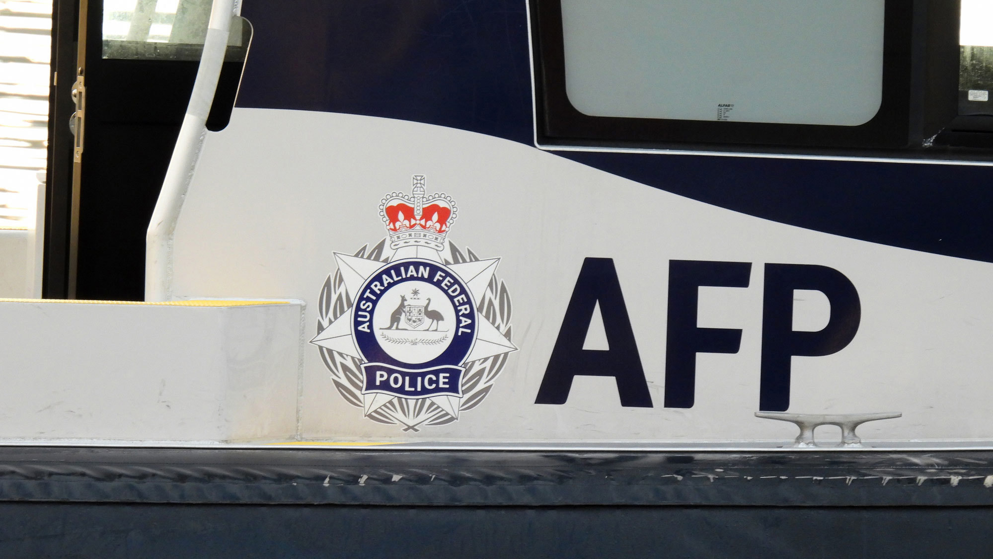 Sydney man charged over alleged death threats to foreign head of state