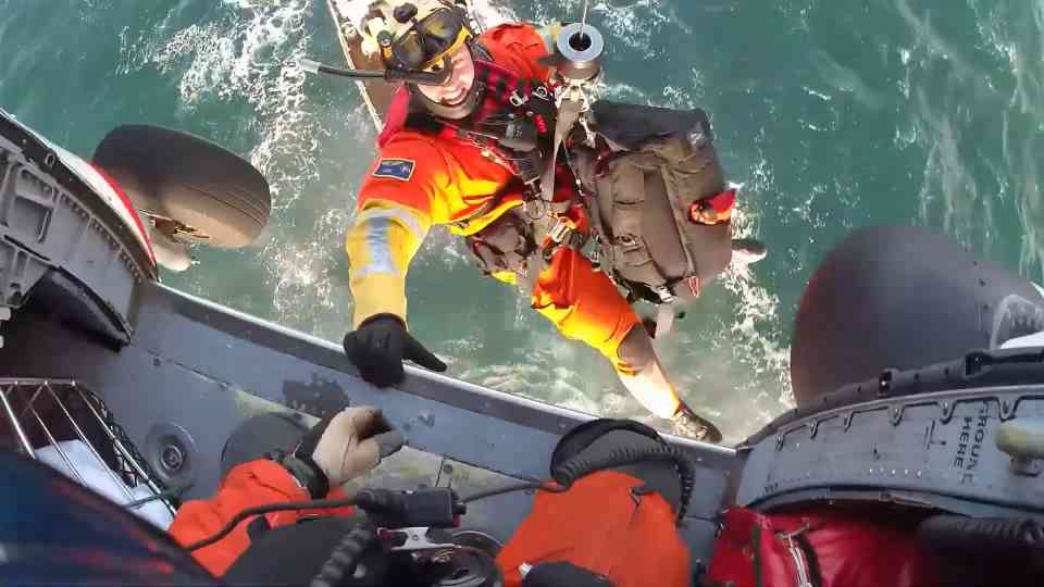 Coast Guard rescues four fishermen from a sinking vessel