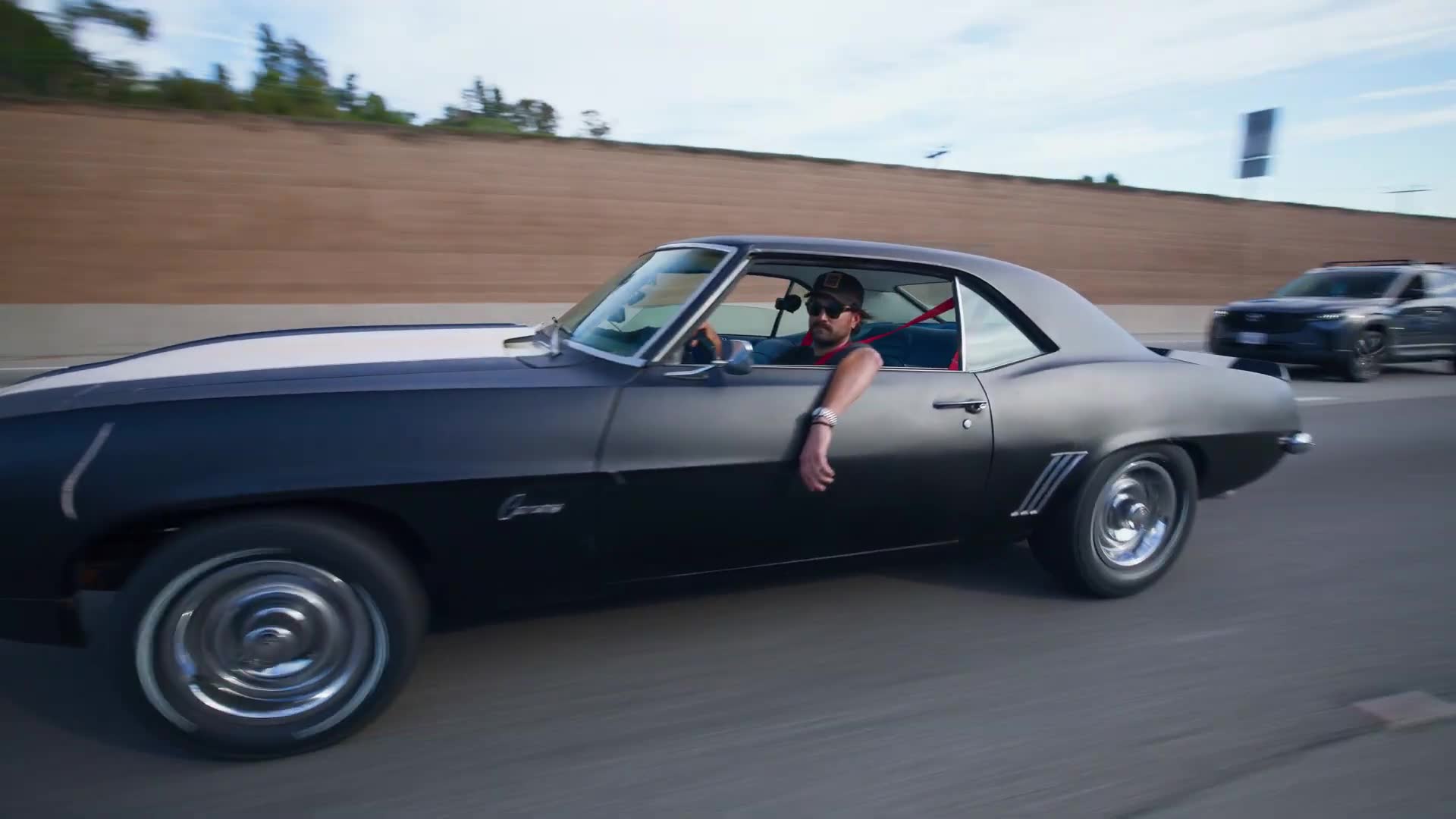 Comparing top-spec and base model Chevrolet muscle cars