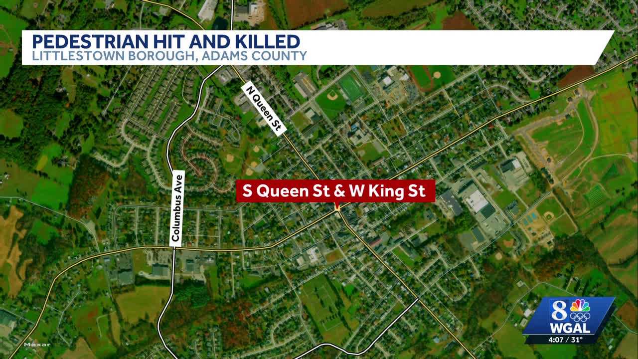 Woman struck, killed while crossing the street, police say