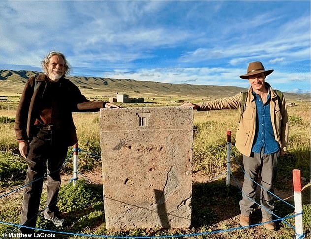 Matthew LaCroix (right) told Daily Mail the discovery, sparked by a recent find in Egypt, links symbols across continents and dates back as far as 38,000 to 40,000 years ago. Pictured is a T-shaped symbol at the center of the stone slab