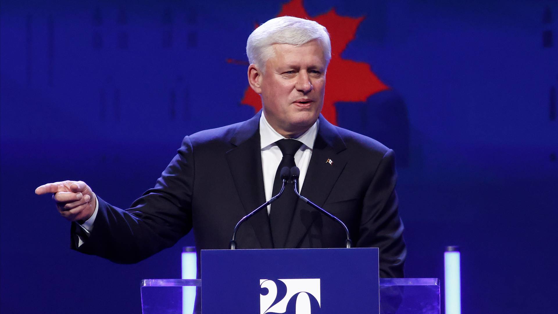 Former PM Harper says Canada's difficulties can't all be blamed on Trump