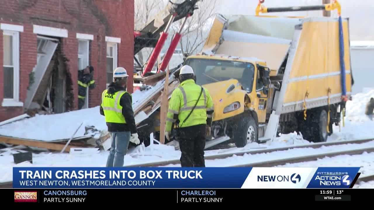 Stuck box truck hit by train, collides with home in Westmoreland County