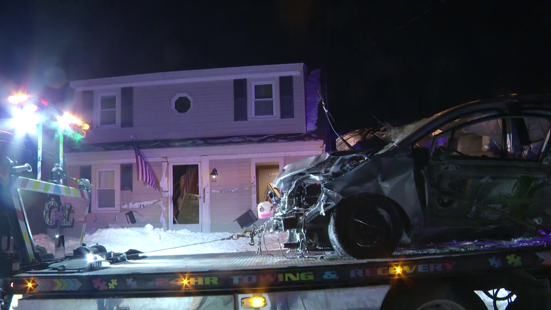 Driver faces charges after car plows into home