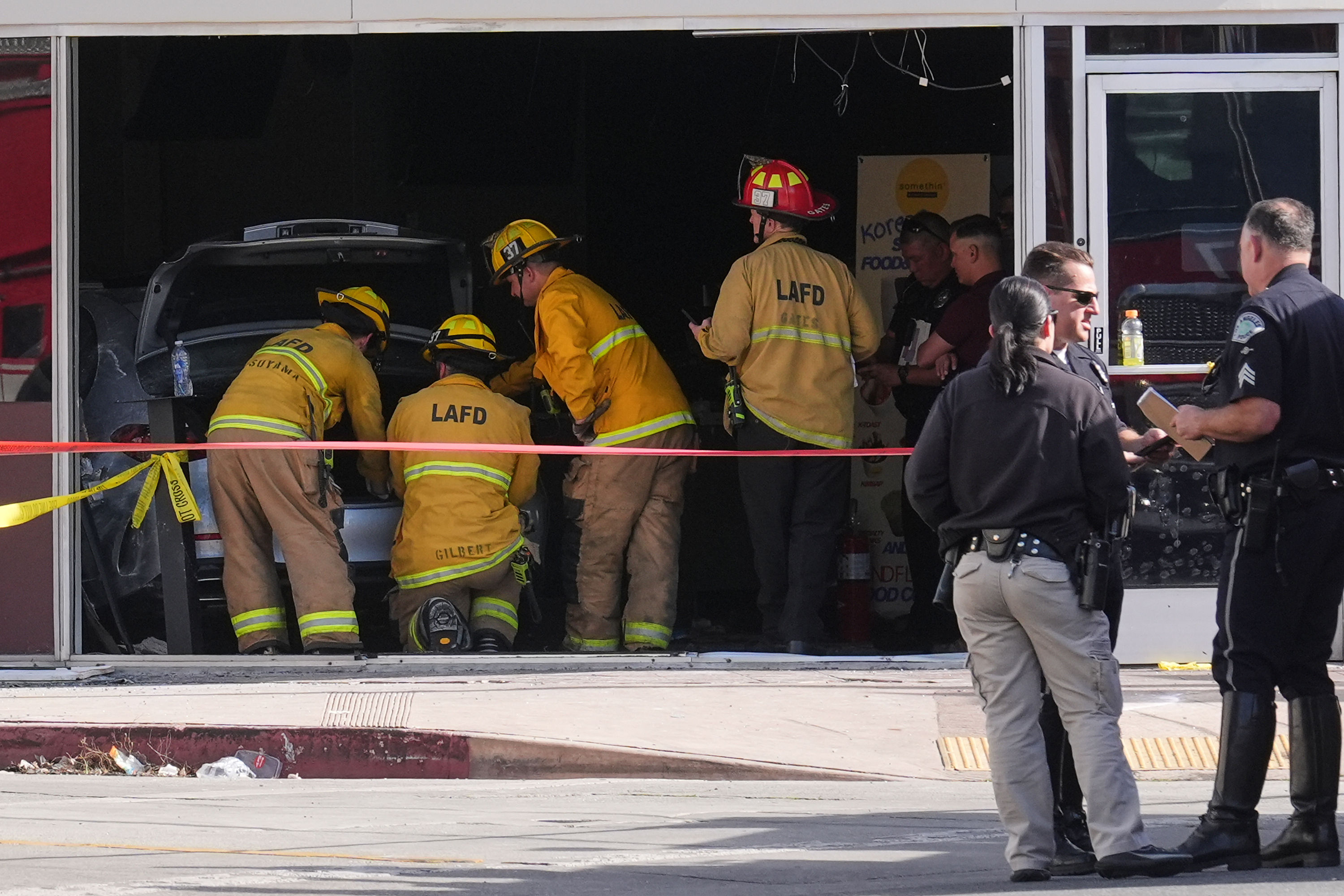 Three killed, six injured after car slams into Los Angeles grocery store