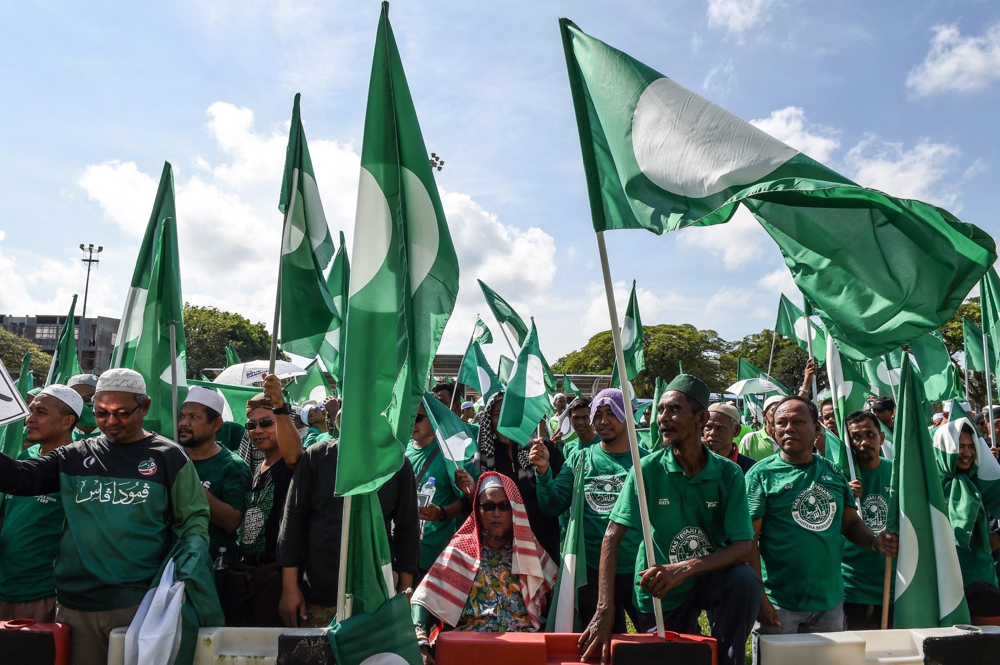 Supporters of the Pan-Malaysian Islamic Party gathering in Pekan ahead of the 2018 general election. PAS has objected to Malaysian Minister Nga Kor Ming's use of several Arabic phrases in parliament. Photo: AFP