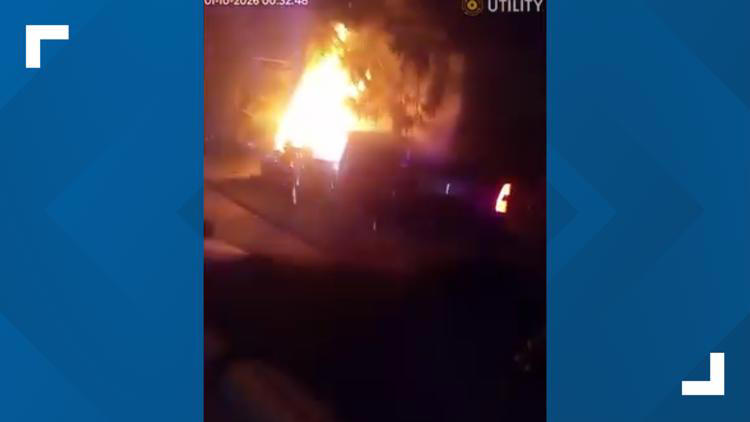 Watch: Indianapolis police officers rescue driver from burning truck