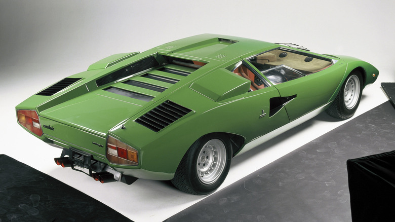 Rear overhead 3/4 view of Lamborghini Countach LP400 in studio setting